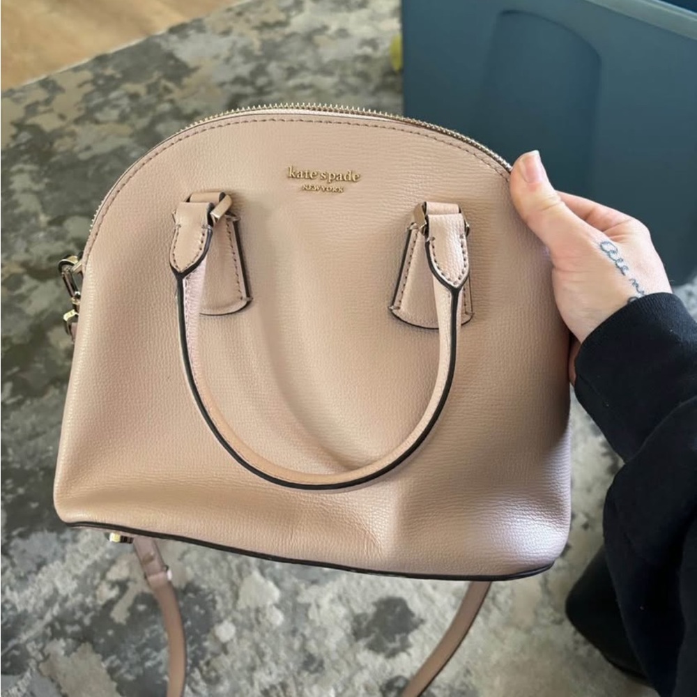 Kate Spade Cream Crossbody Bag with Classic Silhouette